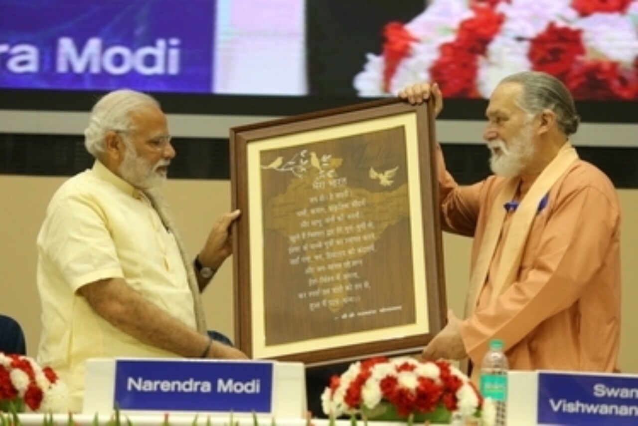 Sri Modi Receives Artistic Rendering of YSS Stamp